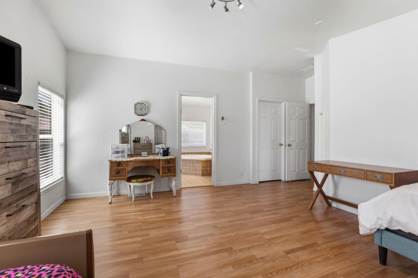 500 West 10th Street, Unit 119 Gilroy, CA 95020 - Photo 11 of 27 a view of a dining room with furniture and chandelier