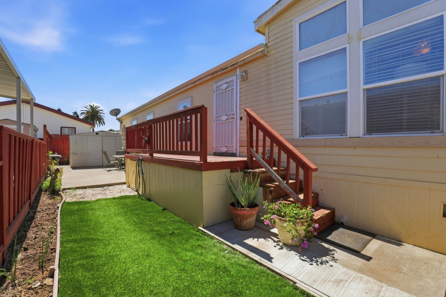 500 West 10th Street, Unit 119 Gilroy, CA 95020 - Photo 20 of 27 a view of a house with a yard