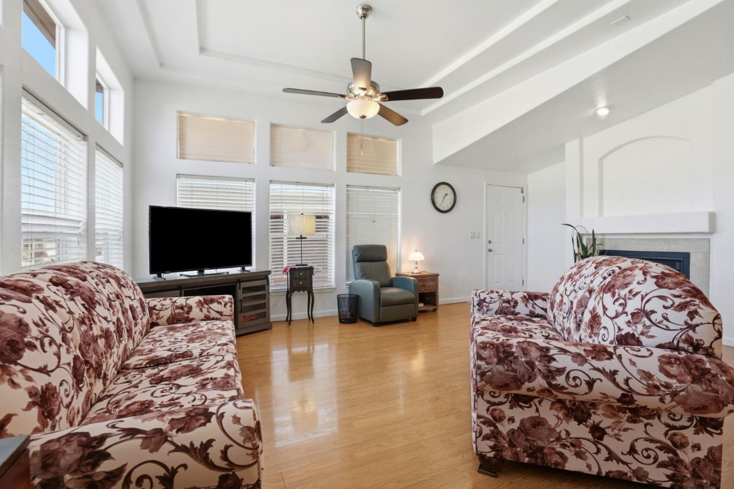 500 West 10th Street, Unit 119 Gilroy, CA 95020 - Photo 3 of 27 a bedroom with bed and a flat screen tv
