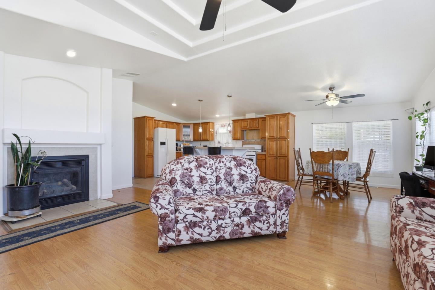 500 West 10th Street, Unit 119 Gilroy, CA 95020 - Photo 4 of 27 a living room with furniture and a fireplace
