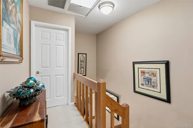 a view of a hallway with flower pot