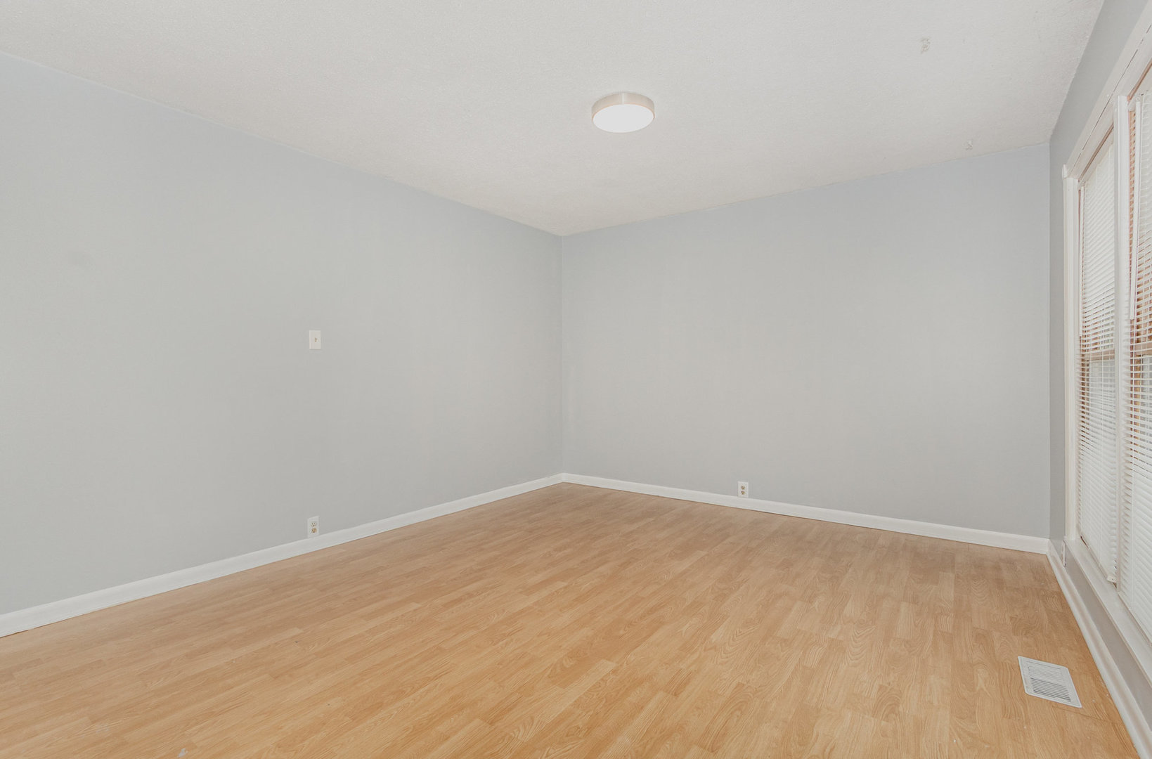 720 Union Avenue Romeoville, IL 60446 - Photo 3 of 15 wooden floor in a empty room
