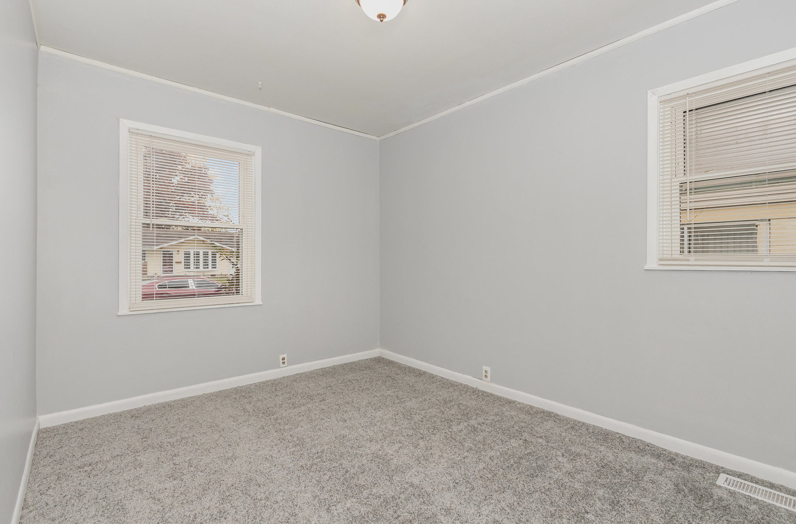 720 Union Avenue Romeoville, IL 60446 - Photo 9 of 15 an empty room with a window