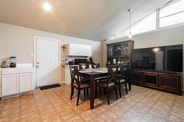 a view of a dining room with furniture