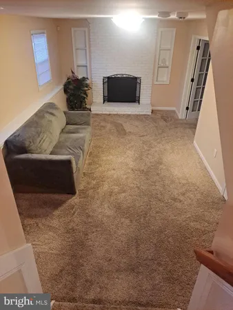 a bathroom with a shower a toilet and a sink