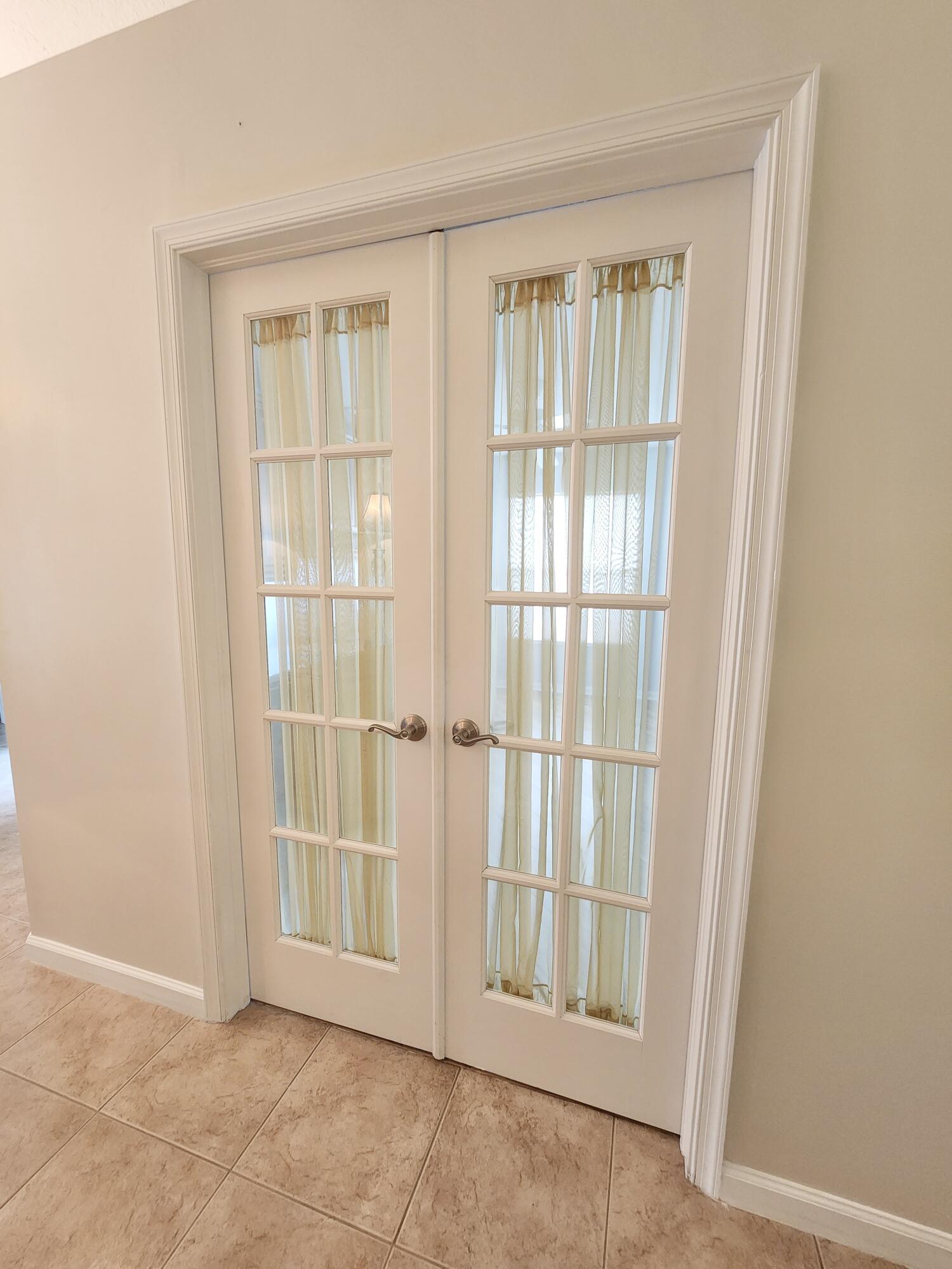 2584 Southwest Impala Way Stuart, FL 34997 - Photo 27 of 72 Bedroom #3 with French Doors