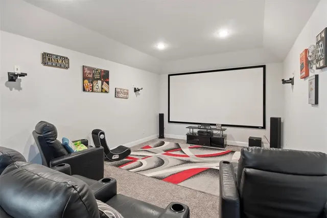 a room with furniture and screen