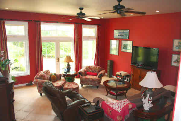 6668 Puupilo Road Kapaa, HI 96746 - Photo 3 of 23 a living room with furniture and a flat screen tv