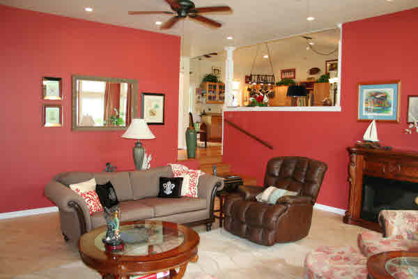 6668 Puupilo Road Kapaa, HI 96746 - Photo 7 of 23 a living room with furniture and a fireplace