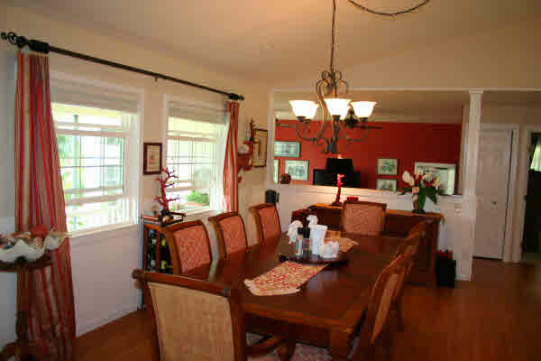 6668 Puupilo Road Kapaa, HI 96746 - Photo 8 of 23 a view of a dining room with furniture window and wooden floor