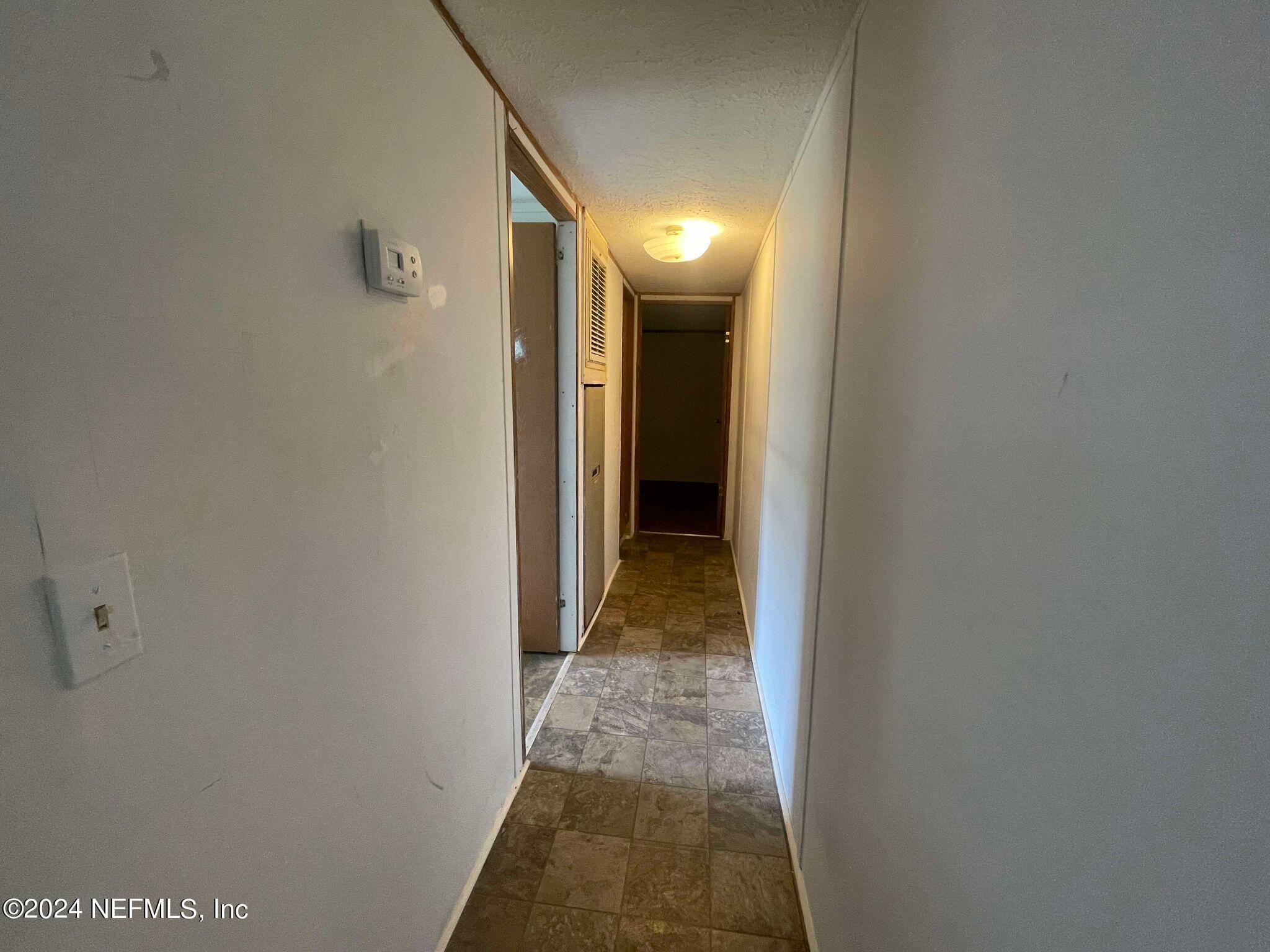 12550 Southeast 55th Place Starke, FL 32091 - Photo 23 of 29 a view of a hallway