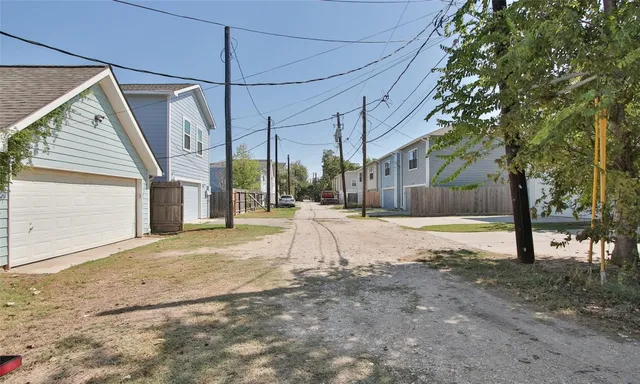 a view of a backyard of the house