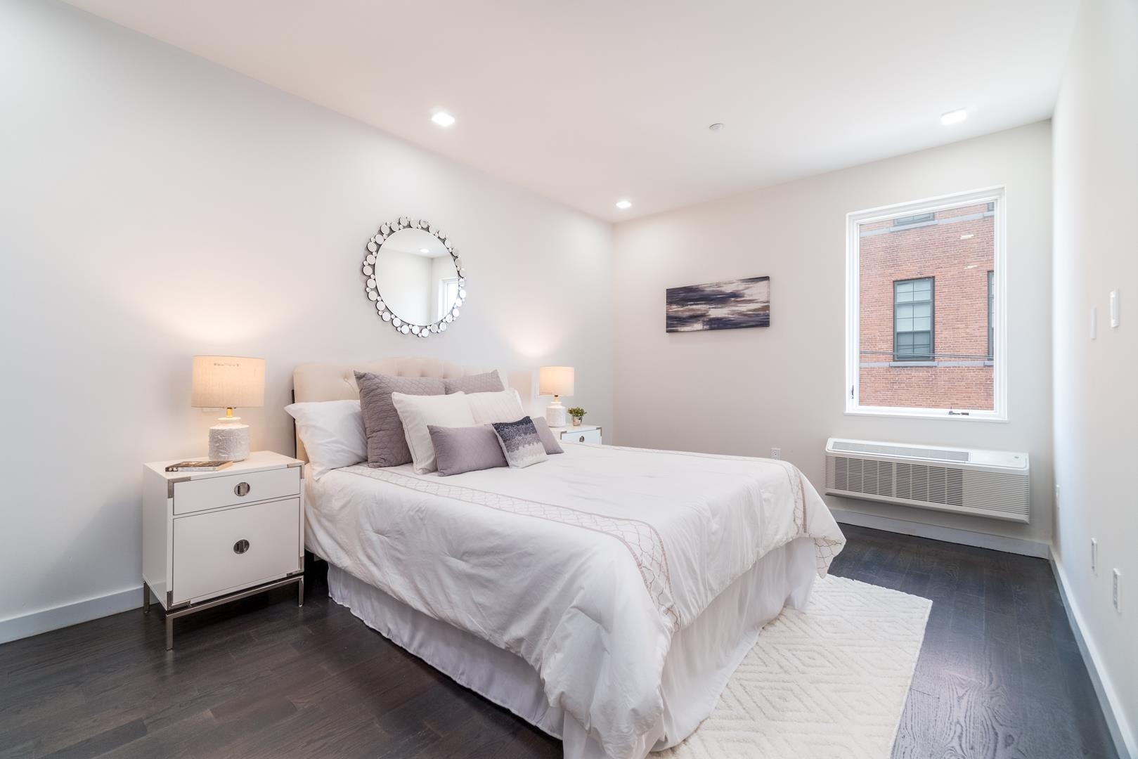 6122 Hudson Avenue, Unit 5A West New York, NJ 07093 - Photo 13 of 29 a bedroom with a bed and a window