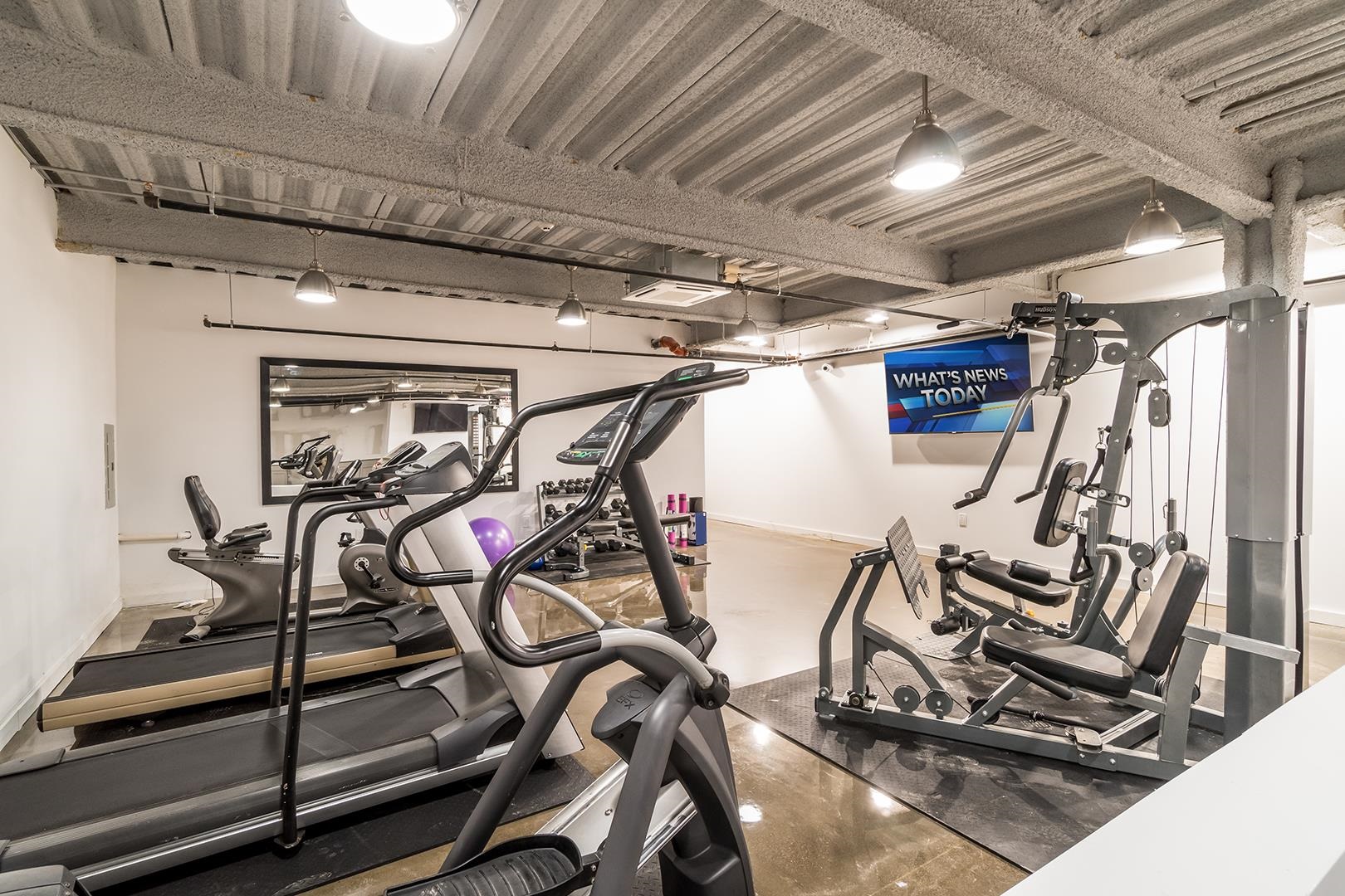 6122 Hudson Avenue, Unit 5A West New York, NJ 07093 - Photo 25 of 29 a view of a room with gym equipment