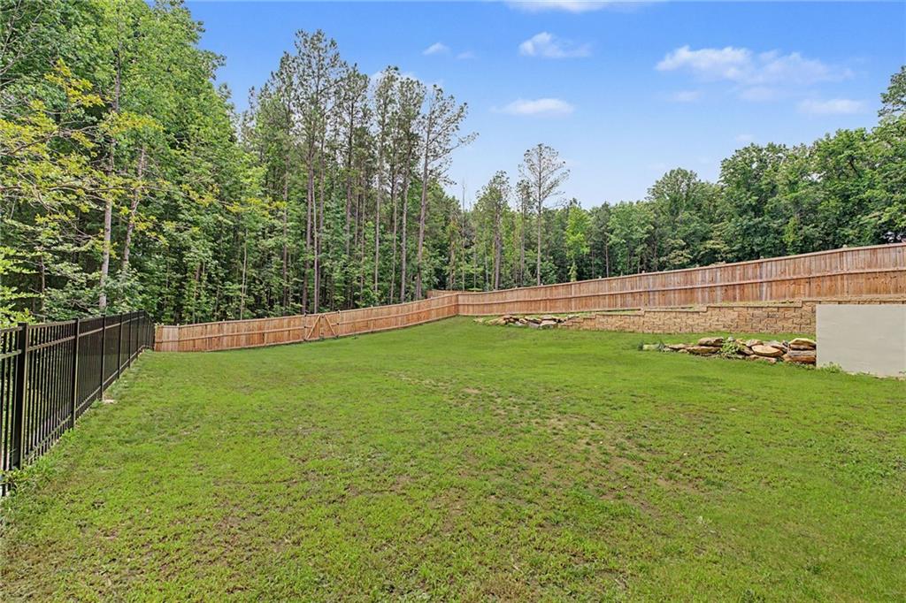376 Hunnicut Road Southeast Mableton, GA 30126 - Photo 70 of 73 a view of outdoor space with deck and yard