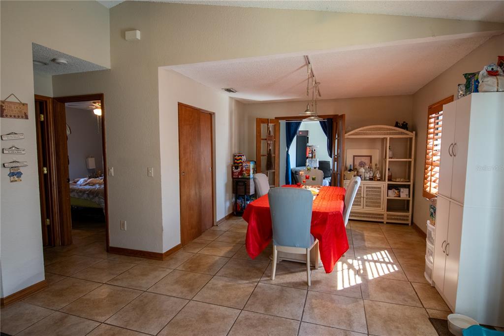 6219 Coliseum Boulevard Port Charlotte, FL 33981 - Photo 18 of 48 a view of a dining room with furniture