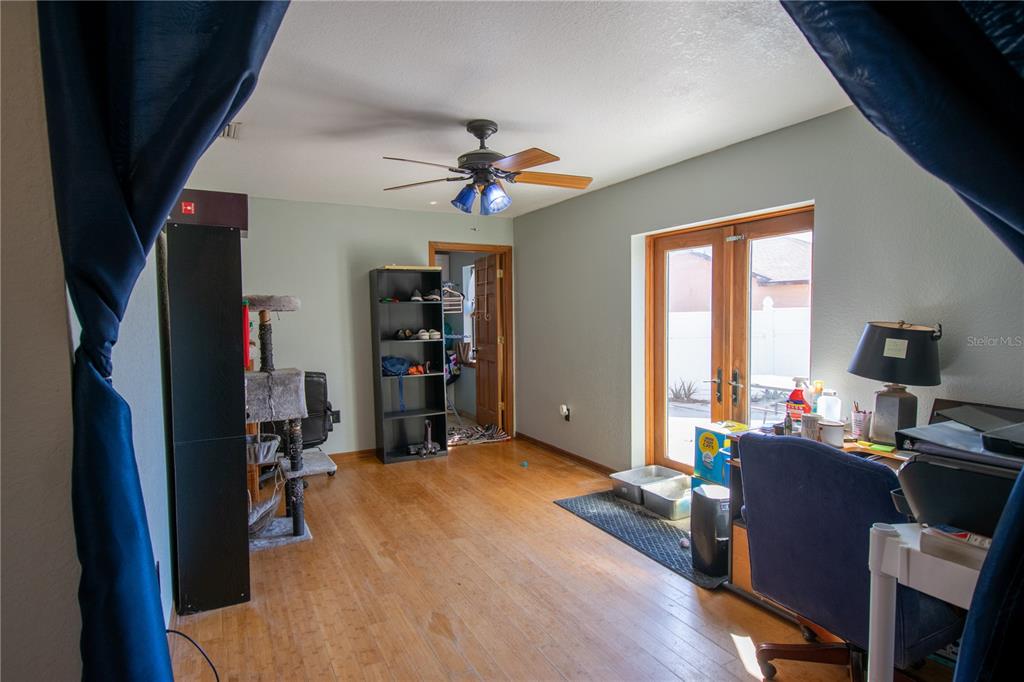 6219 Coliseum Boulevard Port Charlotte, FL 33981 - Photo 19 of 48 a workspace with furniture and a window