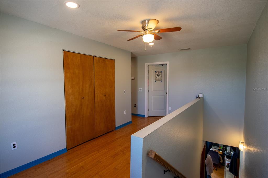 6219 Coliseum Boulevard Port Charlotte, FL 33981 - Photo 27 of 48 a view of entryway and hall with wooden floor