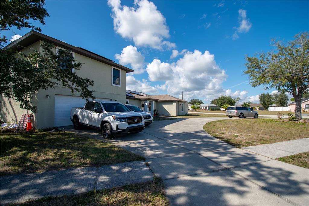 6219 Coliseum Boulevard Port Charlotte, FL 33981 - Photo 3 of 48 a view of a backyard of the house
