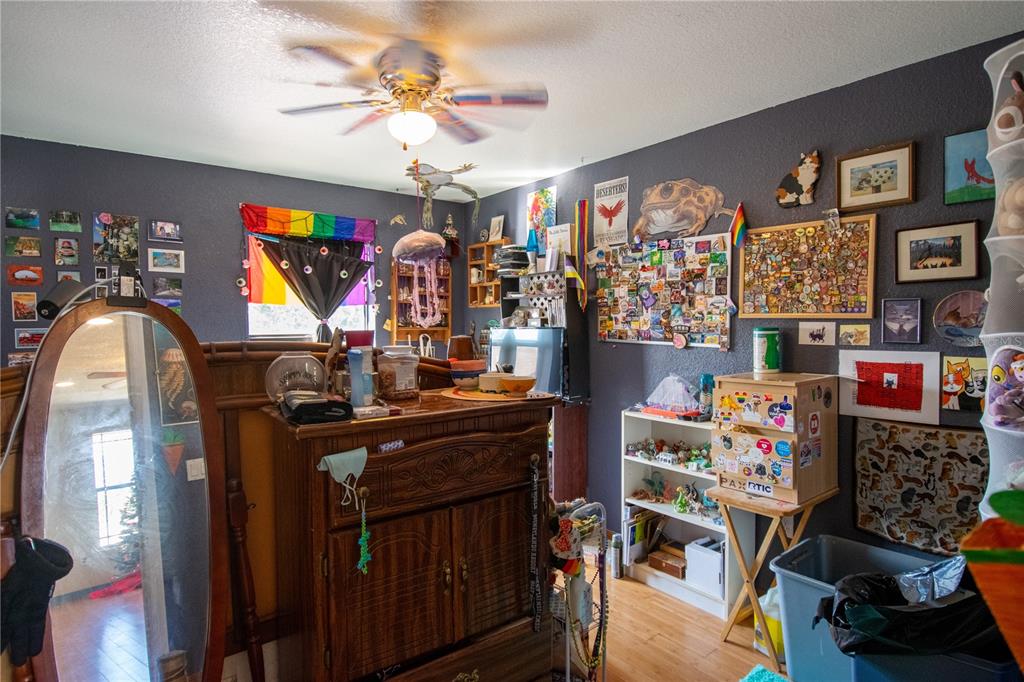 6219 Coliseum Boulevard Port Charlotte, FL 33981 - Photo 33 of 48 a room with furniture and musical instruments