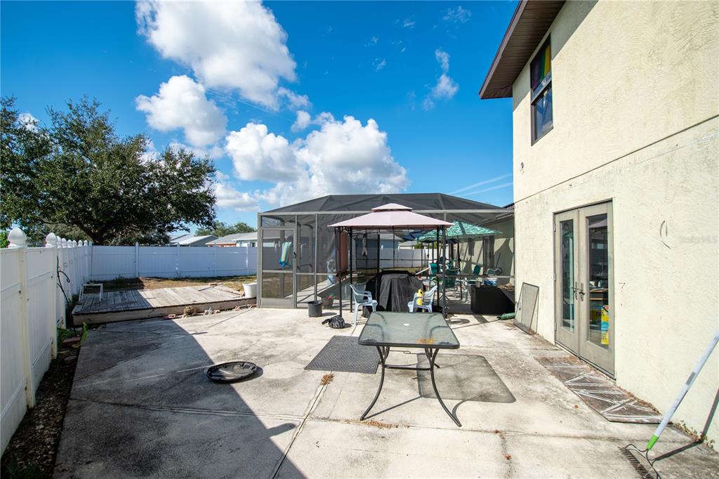 6219 Coliseum Boulevard Port Charlotte, FL 33981 - Photo 40 of 48 a outdoor space with lots of tables and chairs