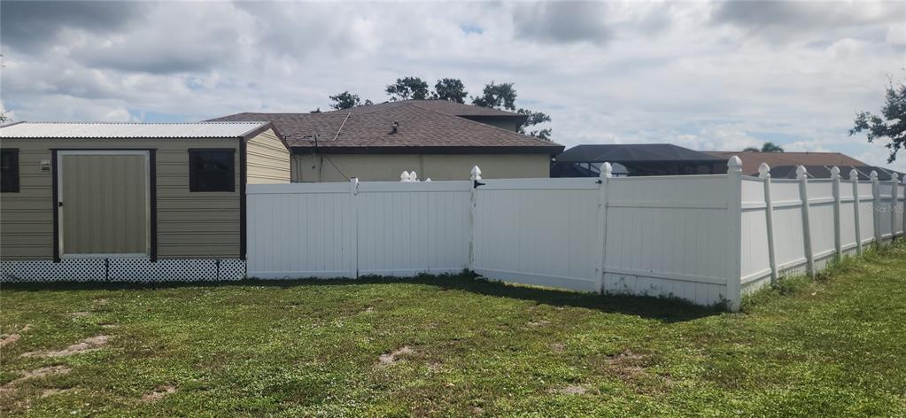6219 Coliseum Boulevard Port Charlotte, FL 33981 - Photo 47 of 48 a view of a backyard