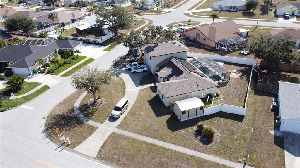 6219 Coliseum Boulevard Port Charlotte, FL 33981 - Photo 5 of 48 an aerial view of a house with garden space and street view