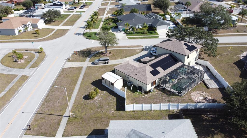 6219 Coliseum Boulevard Port Charlotte, FL 33981 - Photo 6 of 48 an aerial view of a house with swimming pool and outdoor seating