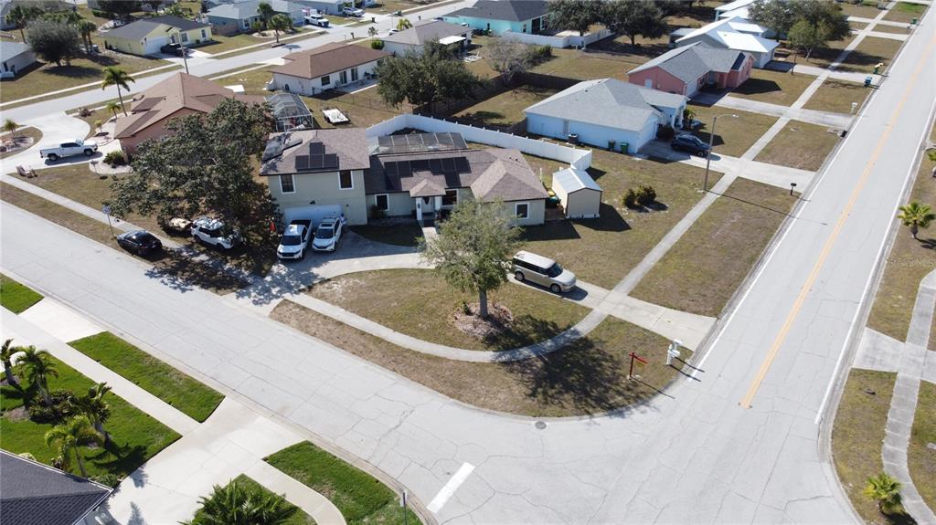 6219 Coliseum Boulevard Port Charlotte, FL 33981 - Photo 8 of 48 an aerial view of a house with garden