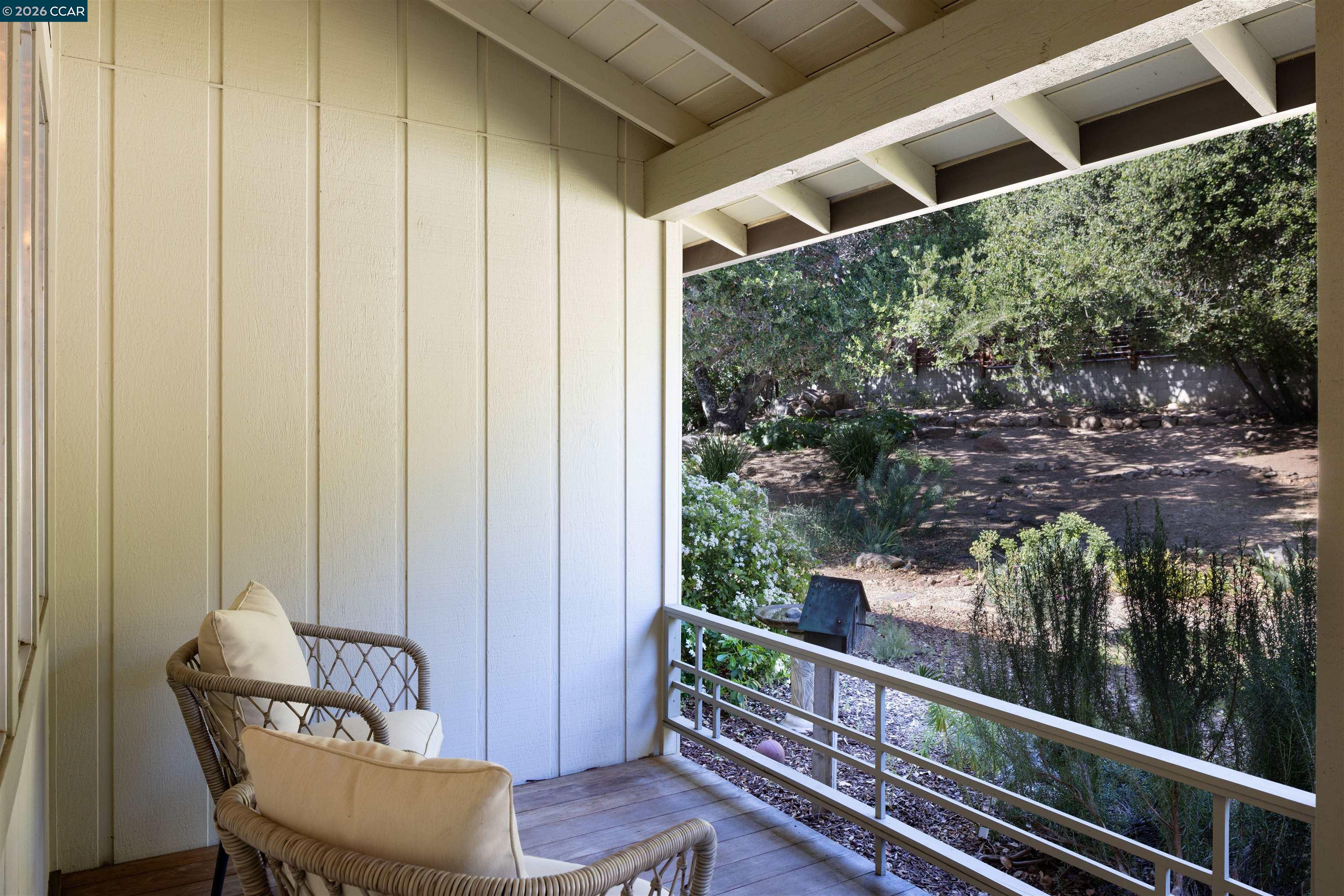 12 Marquard Road Carmel Valley, CA 93924 - Photo 26 of 36 a view of a chair and table in the balcony