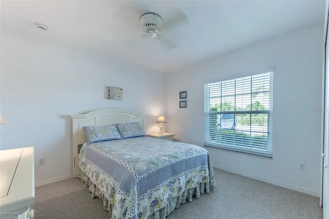 a bedroom with a bed and a closet