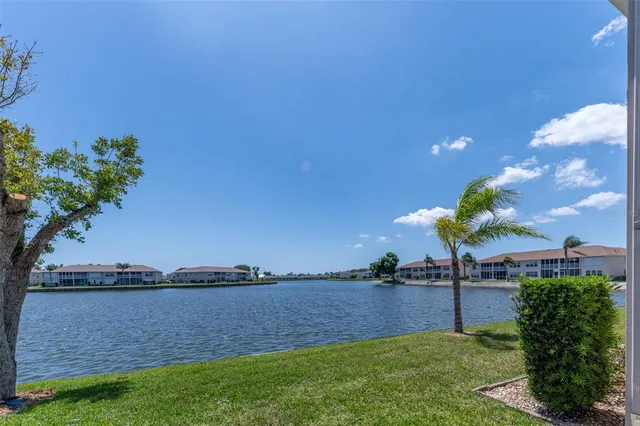 a view of a lake with a yard