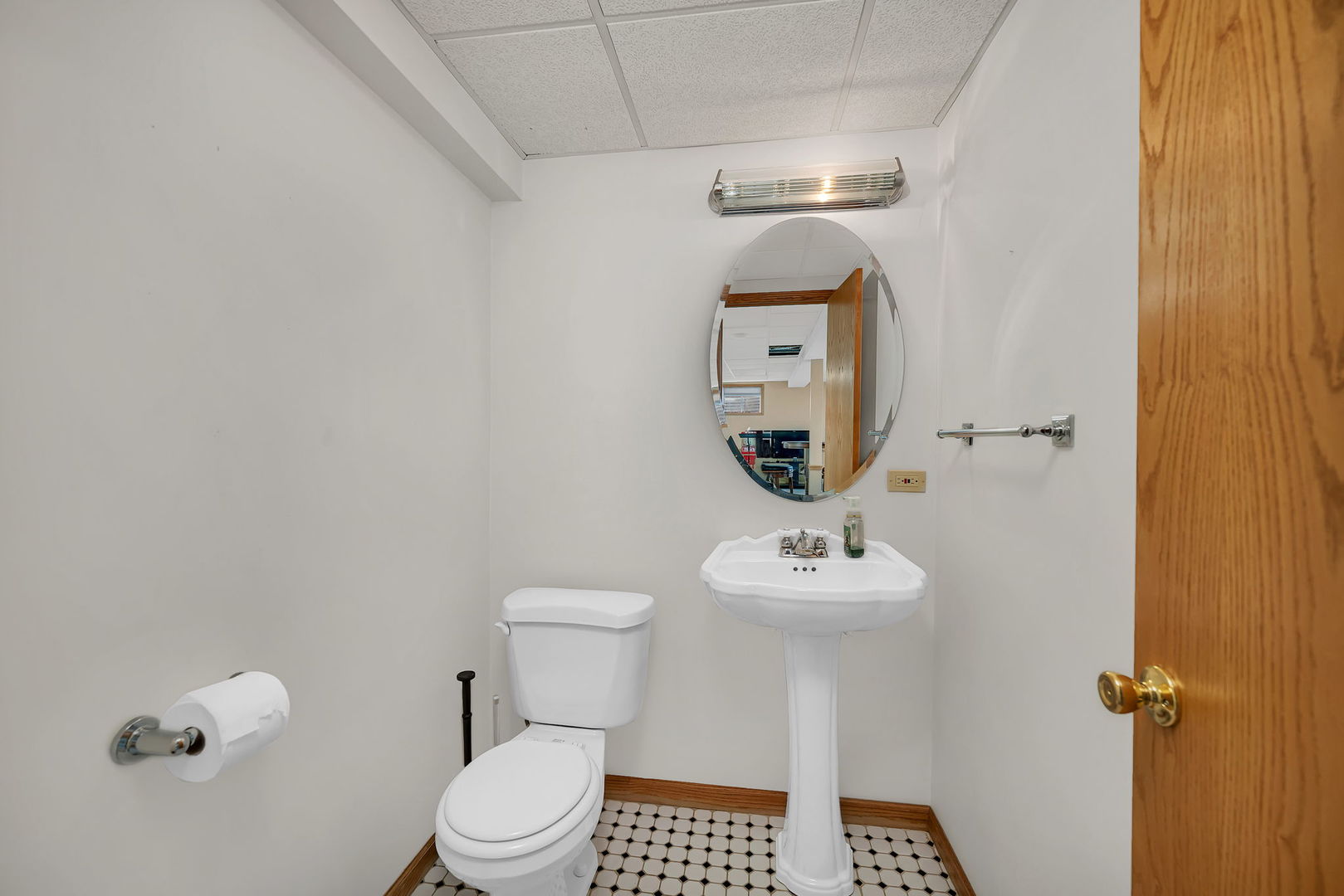 6 West Wend Street Lemont, IL 60439 - Photo 27 of 31 a bathroom with a sink mirror and toilet