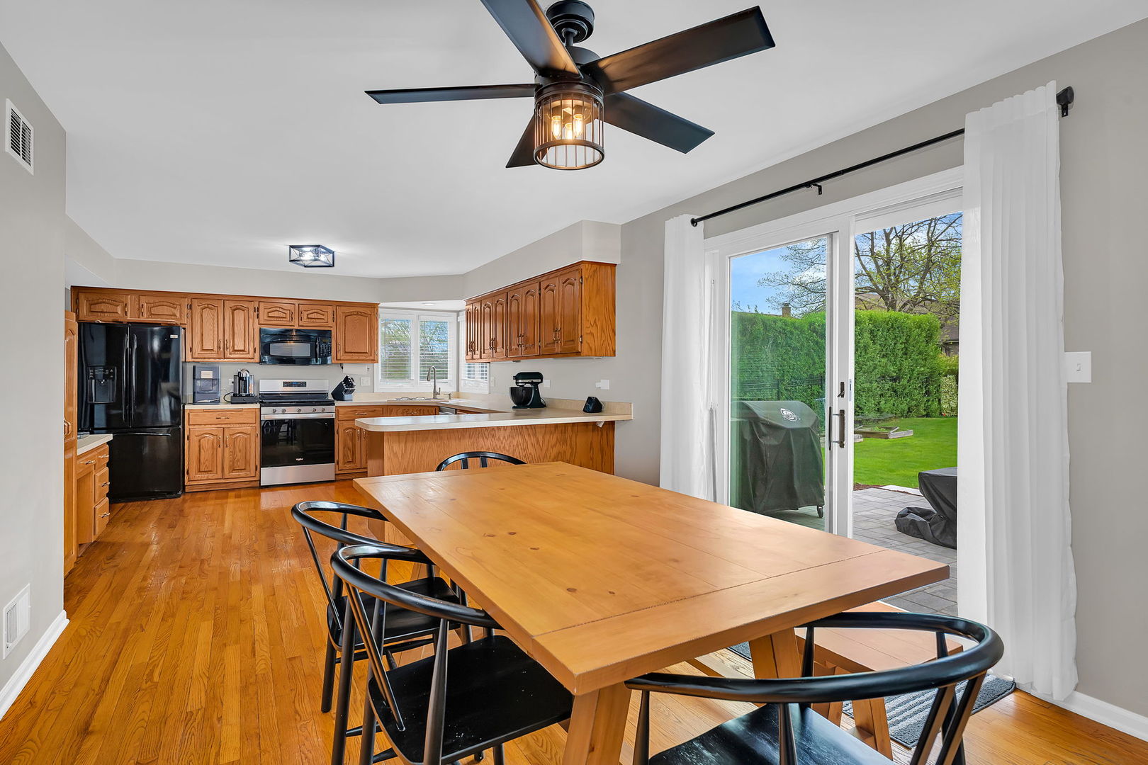 6 West Wend Street Lemont, IL 60439 - Photo 9 of 31 a view of a dining room with furniture window and wooden floor