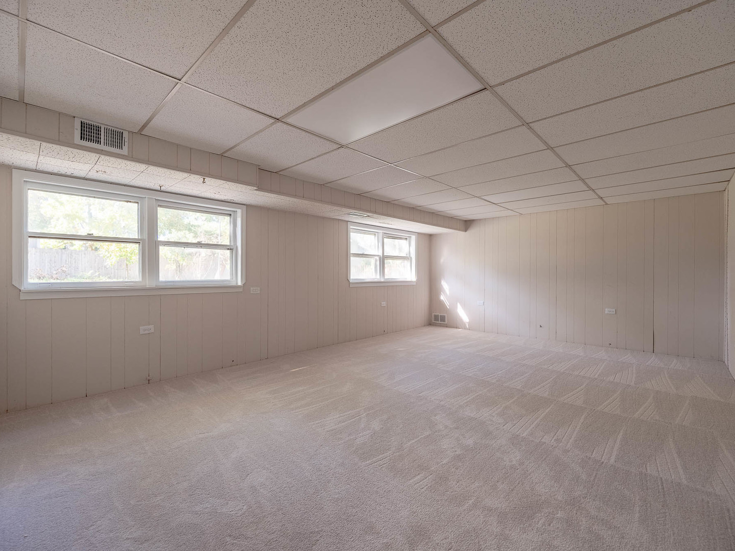 7104 Blackburn Avenue Downers Grove, IL 60516 - Photo 12 of 17 a view of an empty room with a window