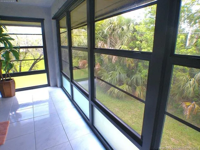 a view of a garden with a house