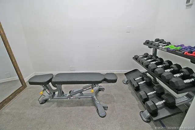 a view of a chairs and table in a yard