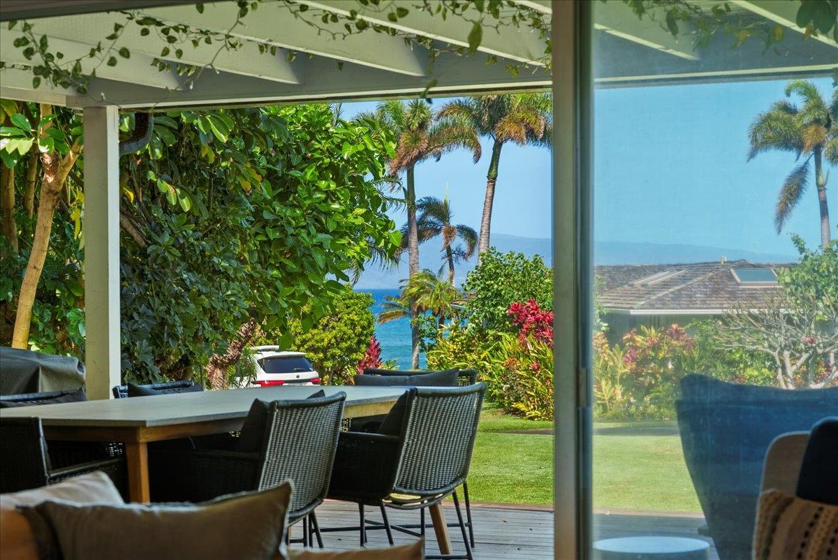 20 Hui Road East, Unit 37 Lahaina, HI 96761 - Photo 16 of 39 a view of an outdoor dining space with a table and chairs