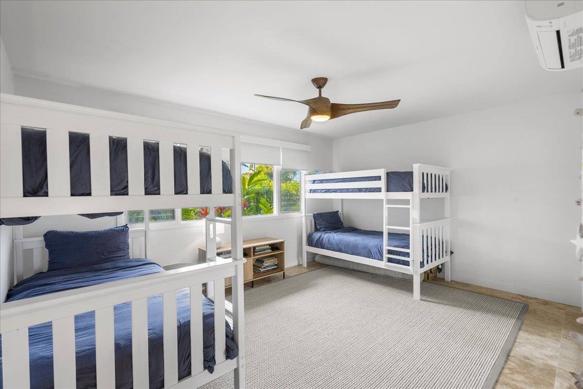 20 Hui Road East, Unit 37 Lahaina, HI 96761 - Photo 28 of 39 a bedroom with furniture and a window