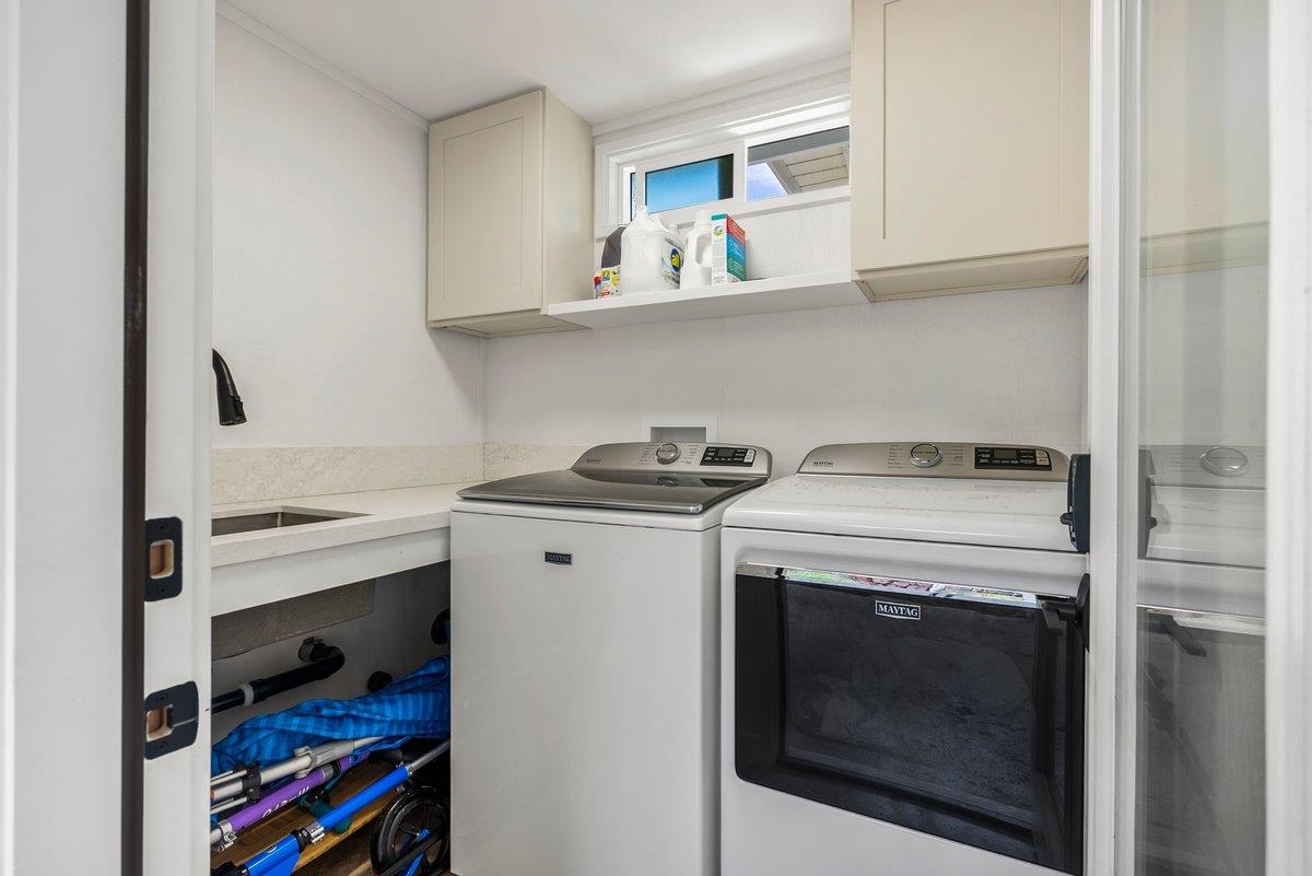 20 Hui Road East, Unit 37 Lahaina, HI 96761 - Photo 32 of 39 a view of a storage and utility room with washer and dryer