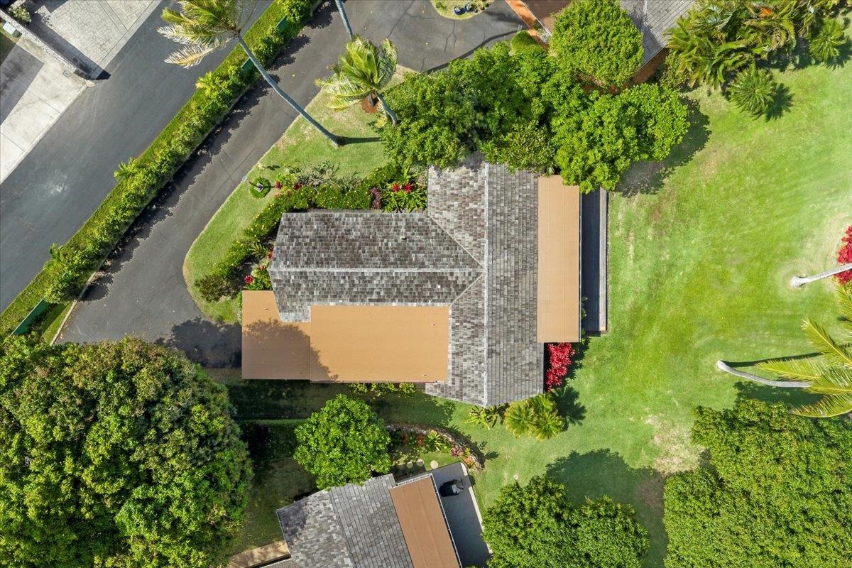 20 Hui Road East, Unit 37 Lahaina, HI 96761 - Photo 37 of 39 an aerial view of a house with a garden and yard