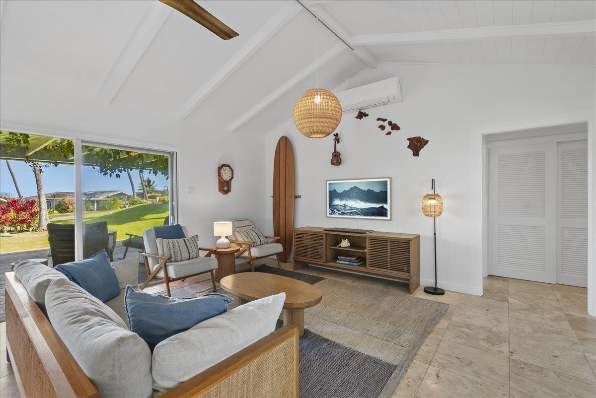 20 Hui Road East, Unit 37 Lahaina, HI 96761 - Photo 7 of 39 a living room with furniture and a fireplace