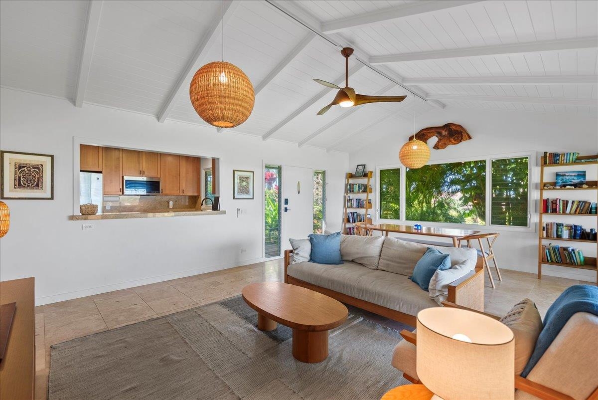 20 Hui Road East, Unit 37 Lahaina, HI 96761 - Photo 9 of 39 a living room with furniture and a large window