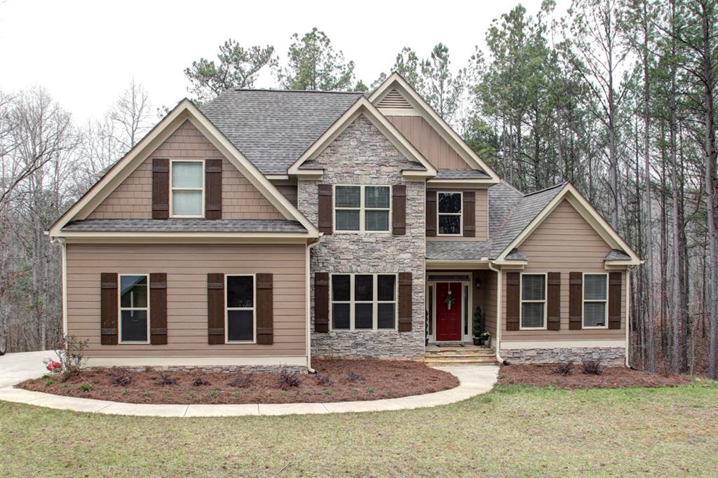 Like new, custom built home on 3.35 acres in quiet neighborhood & highly sought after Cherokee County schools!