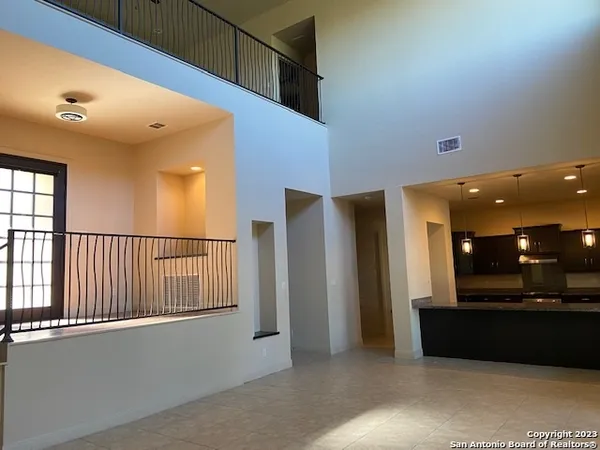 a kitchen with stainless steel appliances granite countertop a sink a stove counter space and cabinets