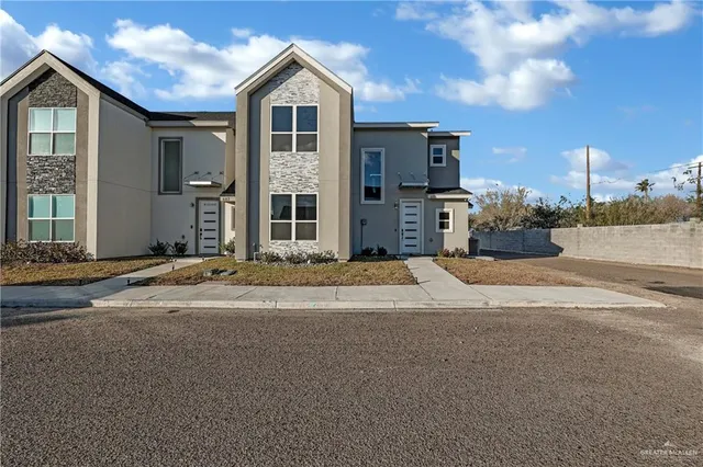 a view of the house with a street