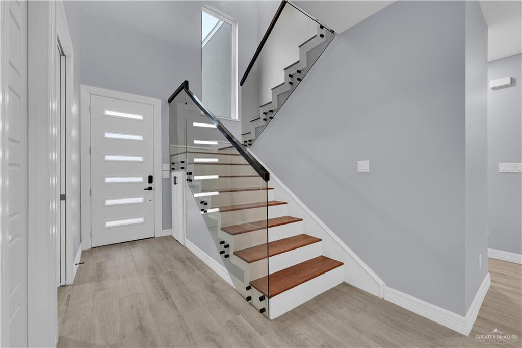 600 West Seminole Avenue Pharr, TX 78577 - Photo 11 of 17 a view of entryway with stairs and wooden floor