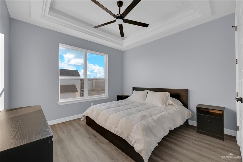 600 West Seminole Avenue Pharr, TX 78577 - Photo 13 of 17 a bedroom with a bed and window