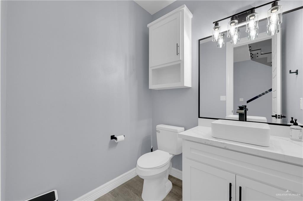 600 West Seminole Avenue Pharr, TX 78577 - Photo 16 of 17 a bathroom with a sink toilet and shower