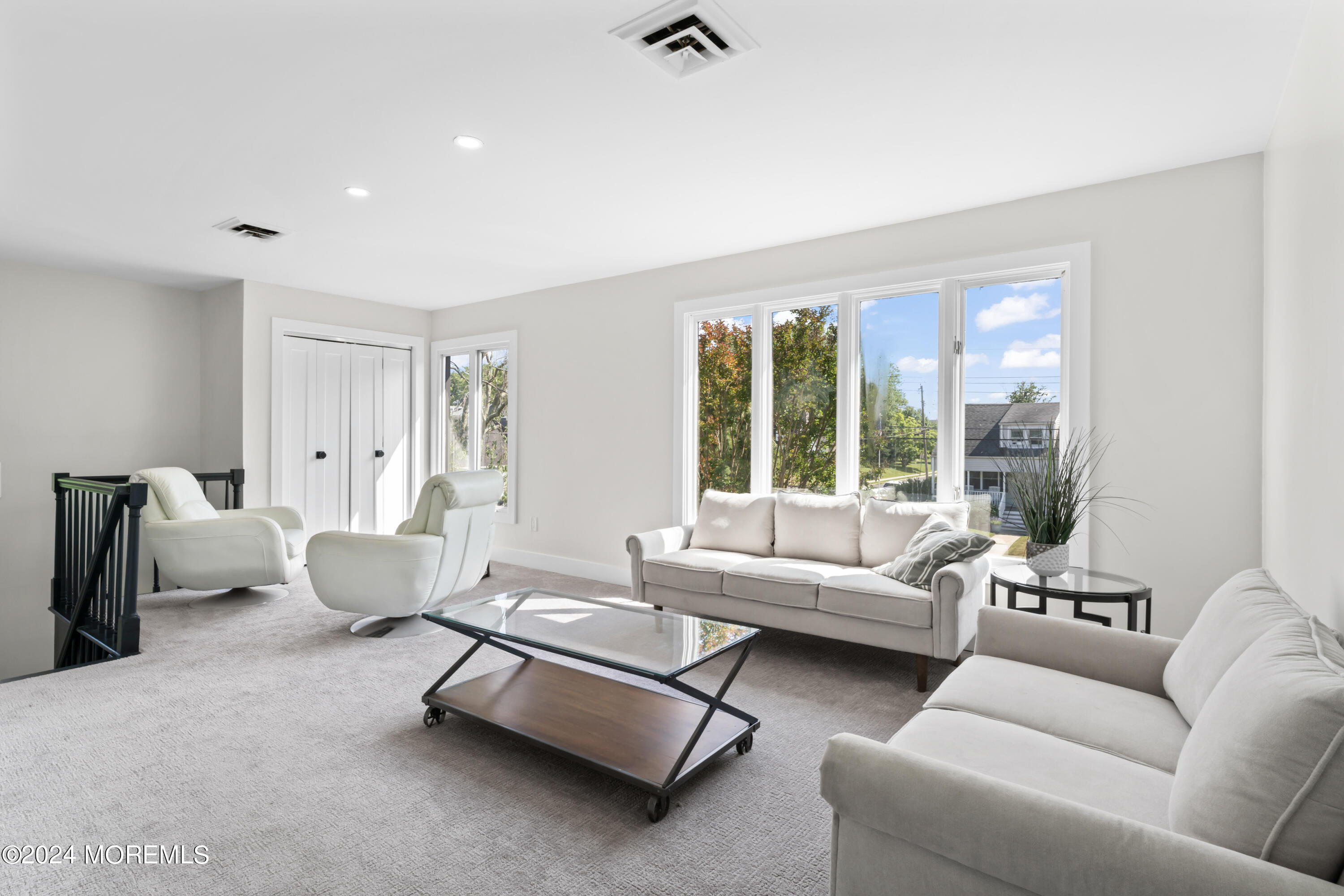 90 Riverview Avenue Neptune, NJ 07753 - Photo 20 of 31 a living room with furniture and a large window